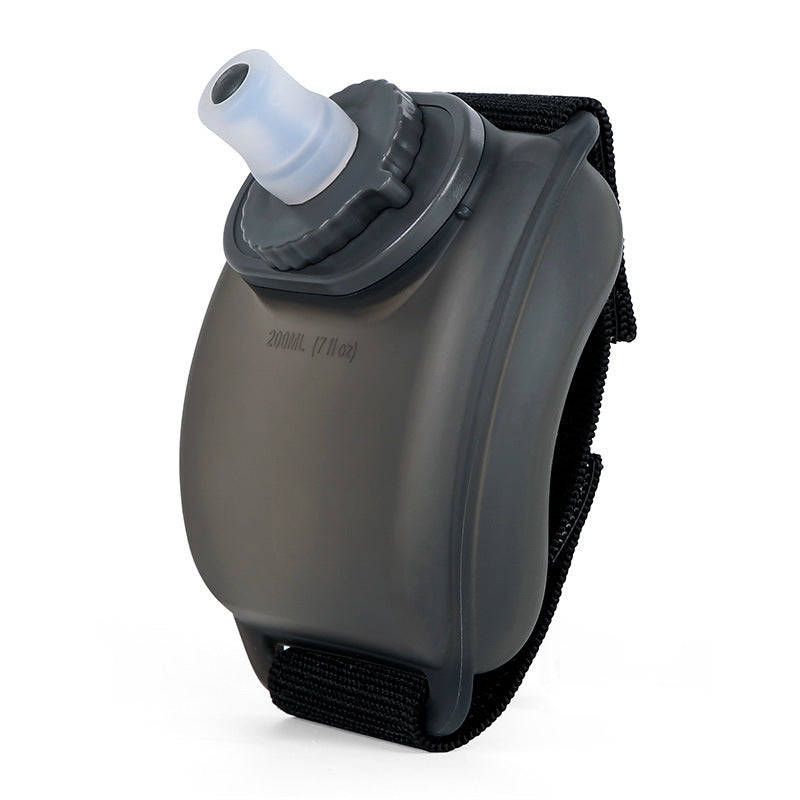 VeyaSports black 200ml silicone wrist water bottle for running and cycling with a secure velcro strap