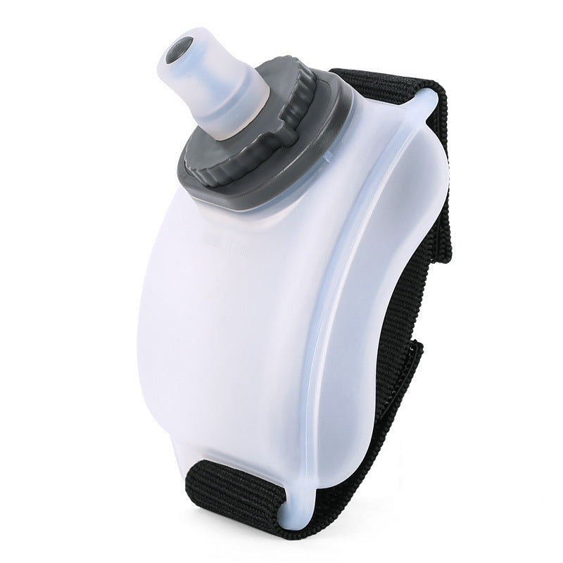 VeyaSports wearable 200ml silicone wrist water bottle for running and cycling with a secure black velcro strap