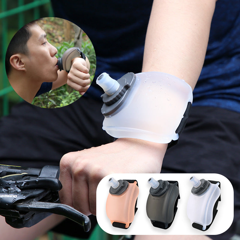 VeyaSports wearable wrist water bottle for running and cycling, featuring a hands-free silicone design in orange and black
